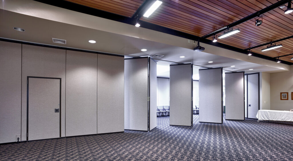 Kwik-Wall 2030 hinged paired panels with pocket doors and pass door panel