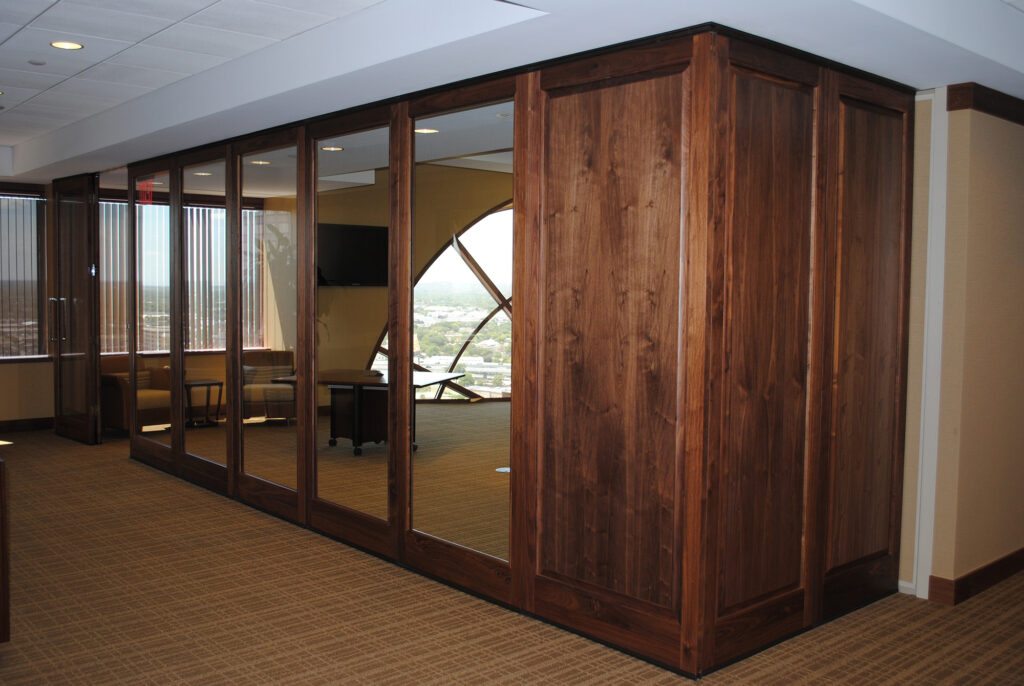 Luminous Mata timber framed glass wall with solid inserts and glass inserts