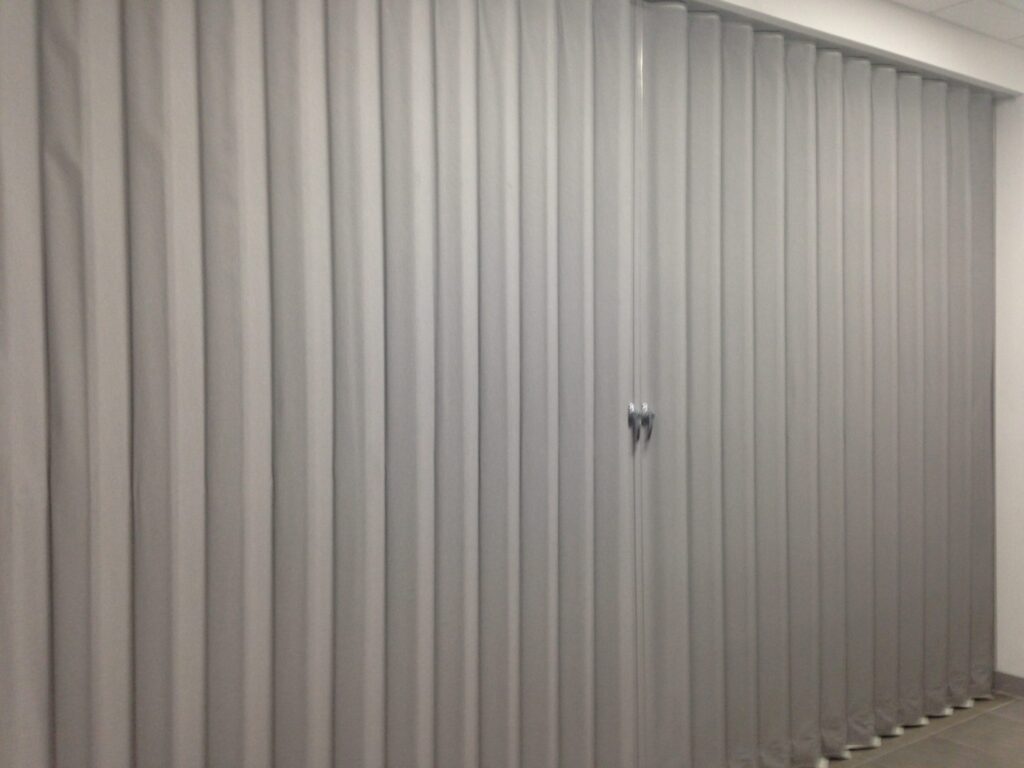 bi-parting Kwik-Wall acoustic accordion partitions, economical room dividers